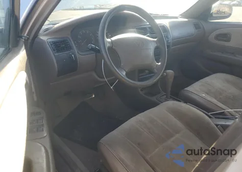 1997 Toyota Corolla Base from USA, damaged, VIN 1NXBA02E5VZ658455